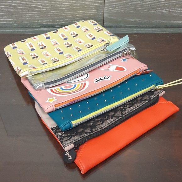 ipsy Handbags - IPSY GLAM  collectible bags ( 6)